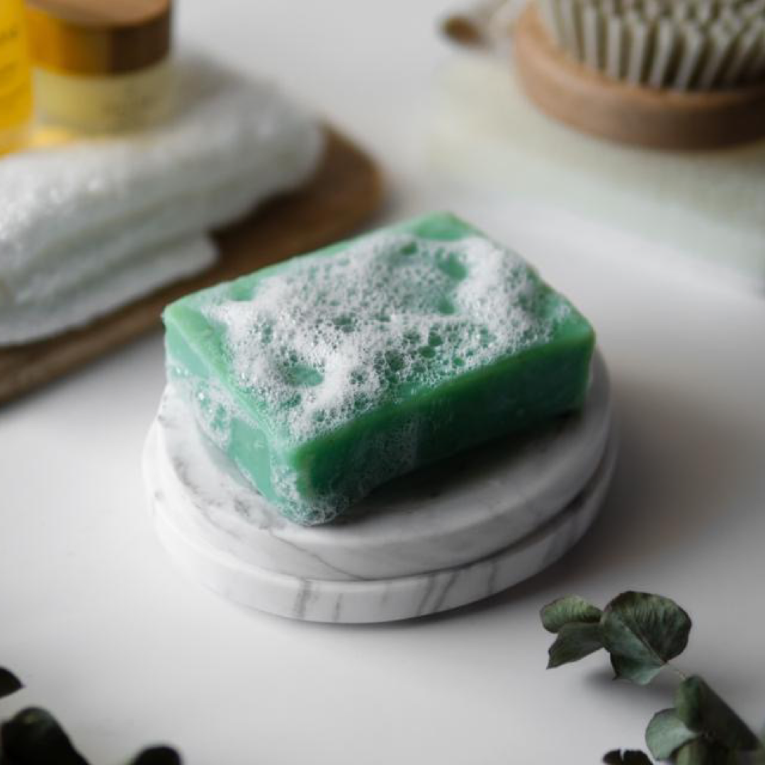 A bar of green lemongrass soap with Toulane natural vegan skincare — organic beauty UAE