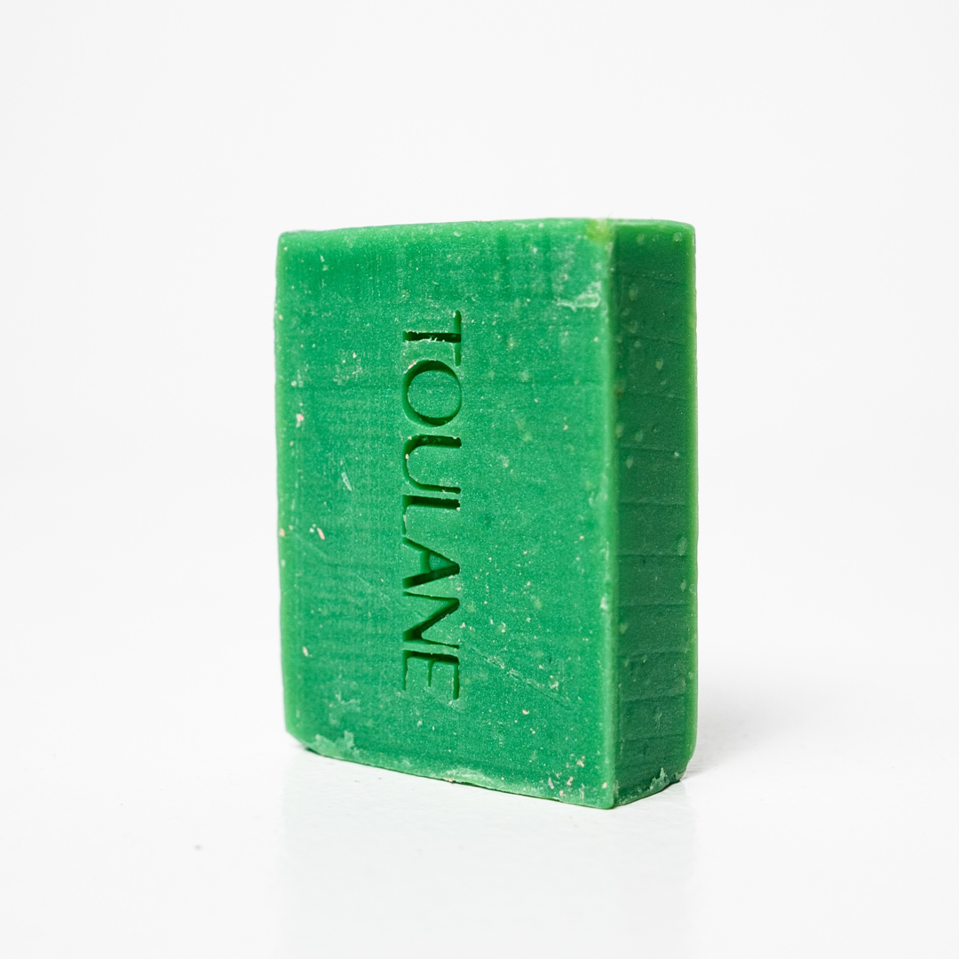 A bar of green lemongrass soap with Toulane natural vegan skincare — organic beauty UAE