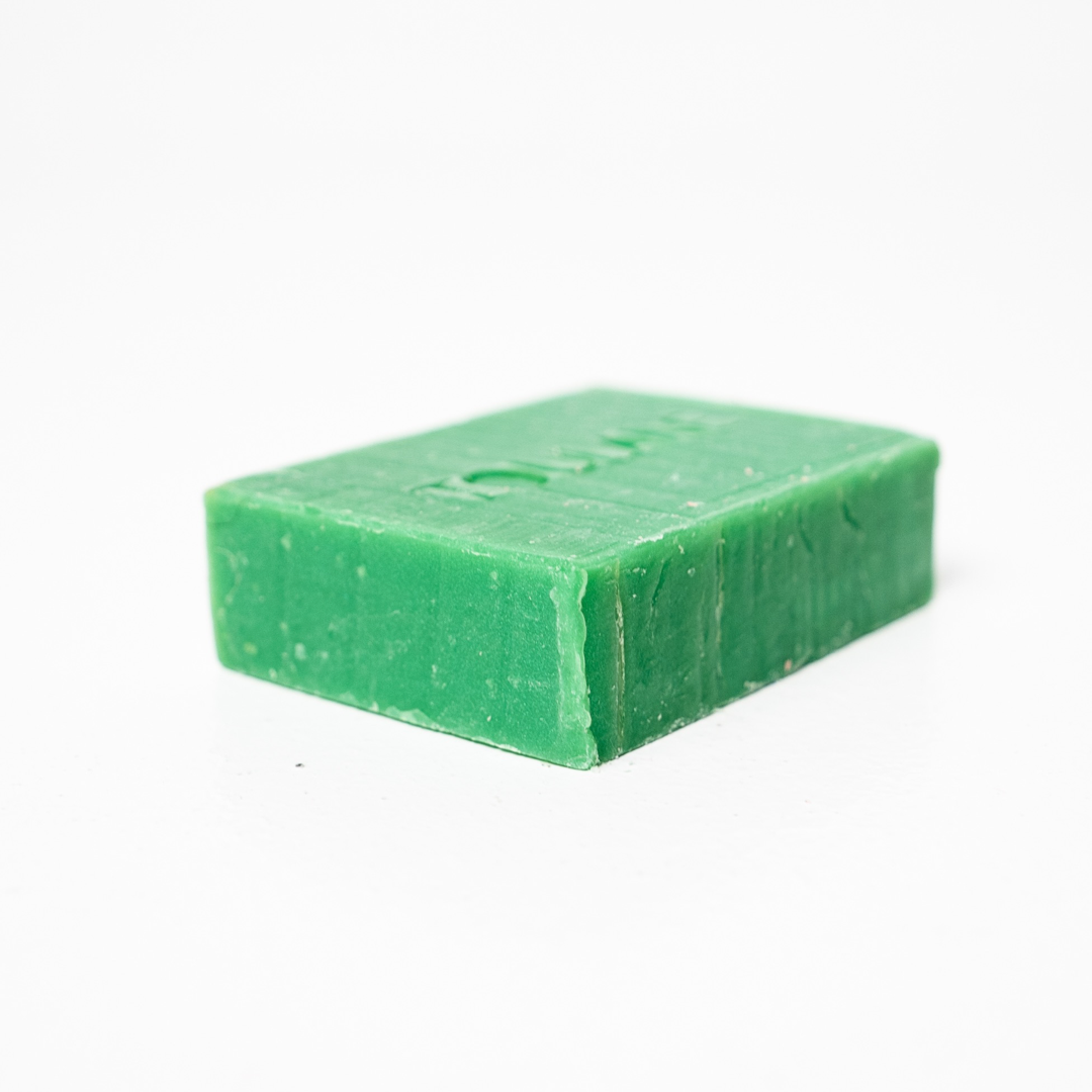 A bar of green lemongrass soap with Toulane natural vegan skincare — organic beauty UAE